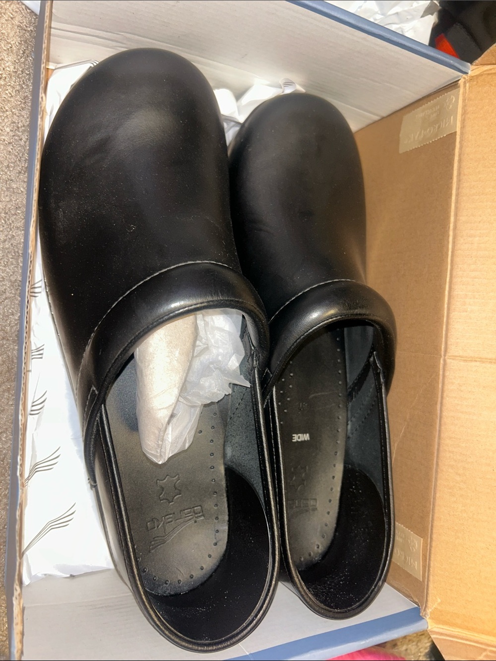 Dansko Black Slip-On Leather Clogs
